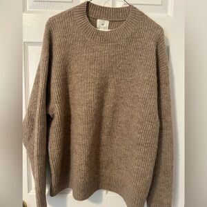 Cozy women’s H & M sweater. Size L.